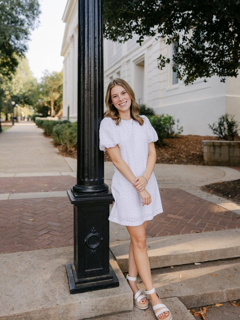 Clare DeBerry poses with the Arch